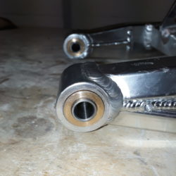 Bushes inserted into Swingarm